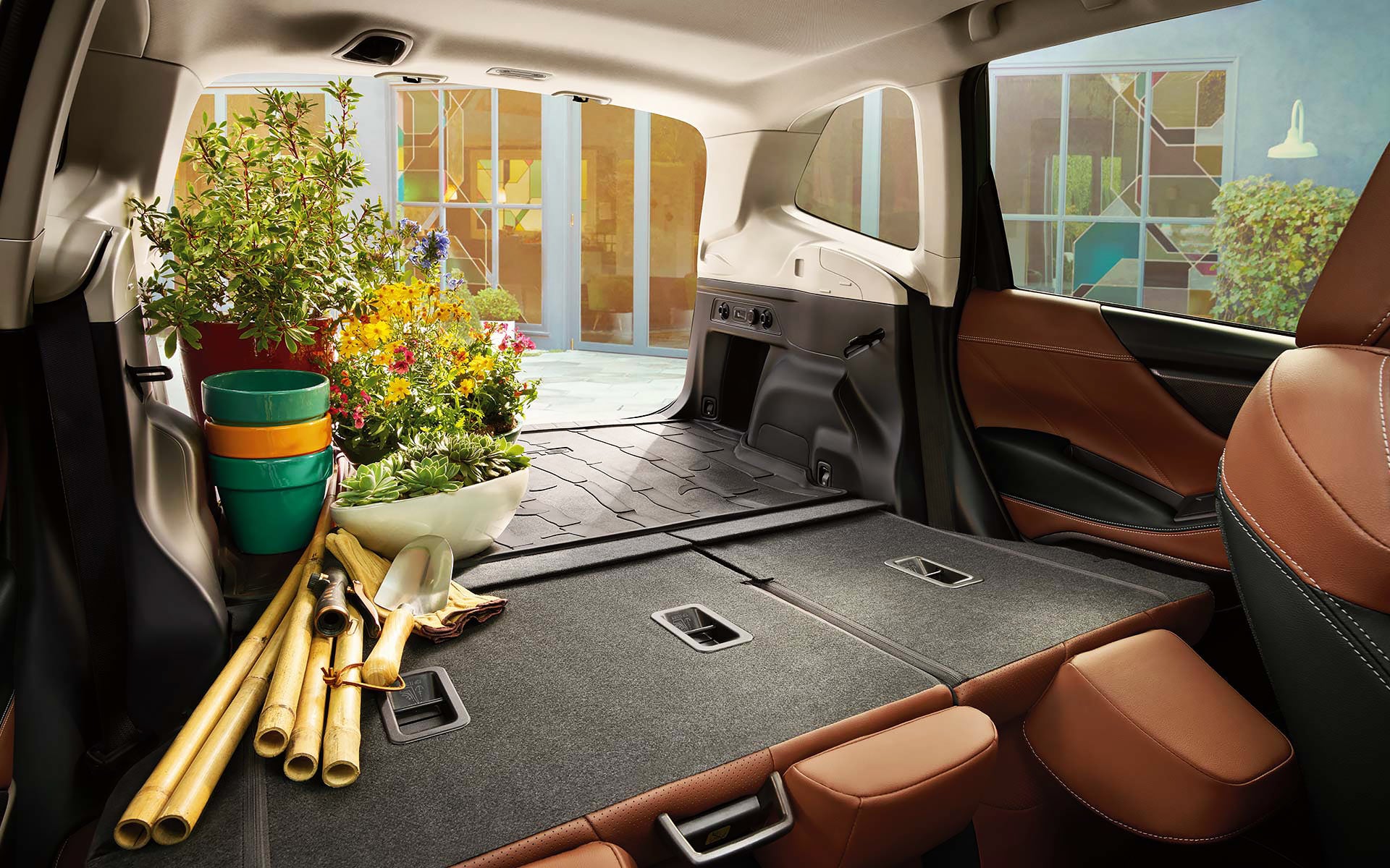 The rear cargo area of the 2022 Forester with the rear seats folded down. | DELLA Subaru of Plattsburgh in Plattsburgh NY